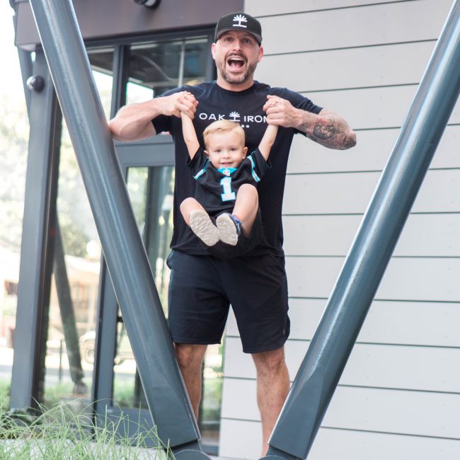 Photo of Matt Gulliver and his son in their Oak and Iron gear!