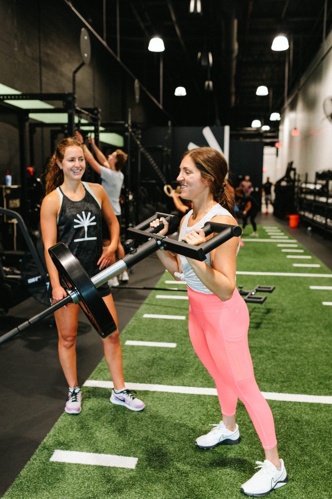 Two people working out together. 