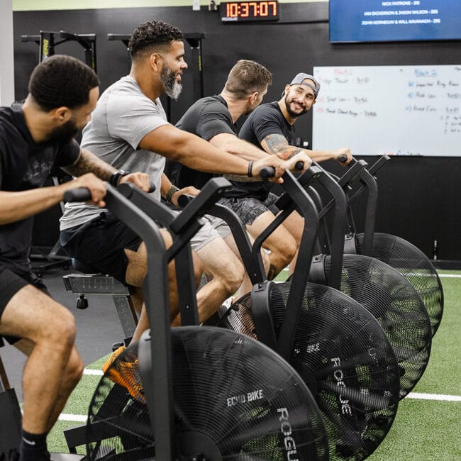 Group fitness training session at Oak and Iron Fitness Cary with members working out together