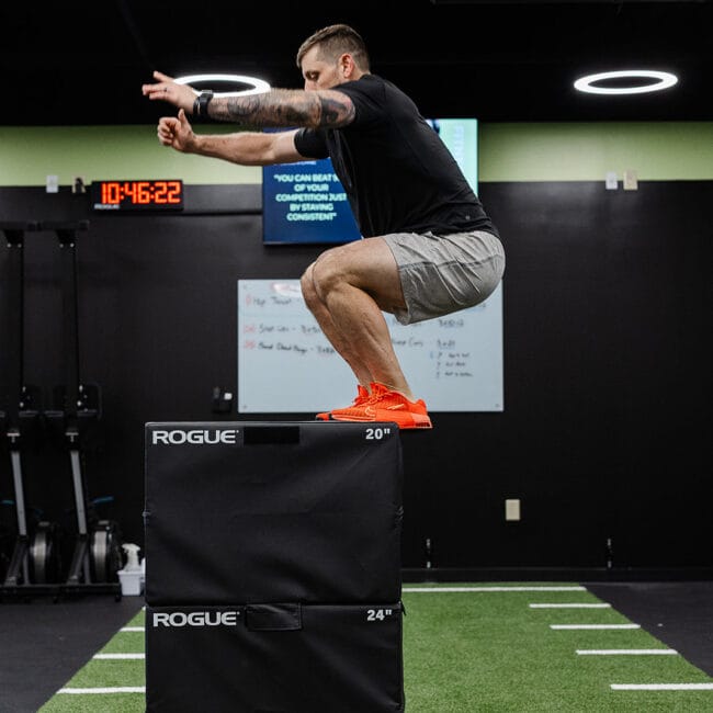 Cary 4 Recovery and mobility class at Oak and Iron Fitness Cary with members stretching and improving flexibility