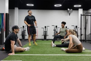 Close-up of Oak and Iron Fitness gym floor and workout gear in Cary facility $99 first month group fitness