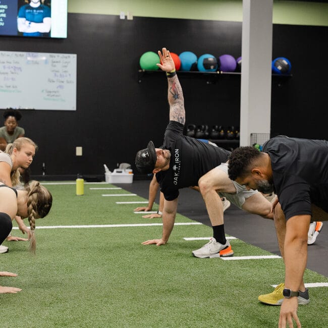 Cary 1 Oak and Iron Fitness gym workout area with strength training equipment in Cary